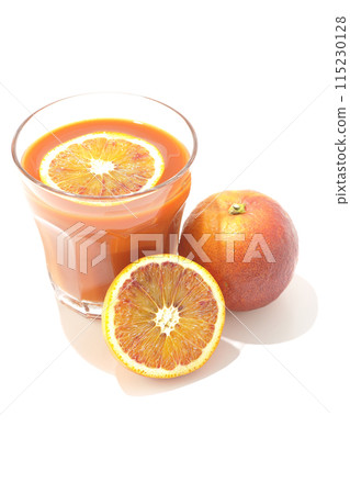 Blood orange juice photographed on a white background Blood orange juice photographed on a white background 115230128