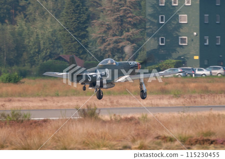 American P-51D Mustang fighter jet taking off 115230455