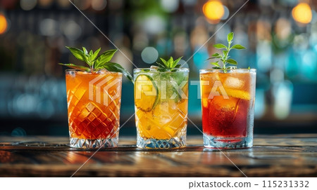 Three Colorful Cocktails on a Wooden Bar Counter Three Colorful Cocktails on a Wooden Bar Counter 115231332