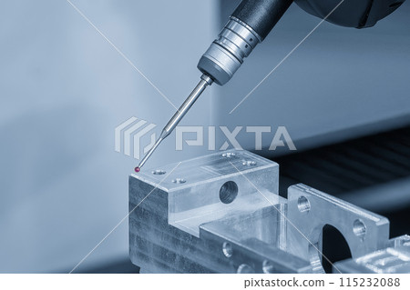 Closeup scene the multi-axis CMM machine measuring the aluminum automotive parts. Closeup scene the multi-axis CMM machine measuring the aluminum automotive parts. 115232088