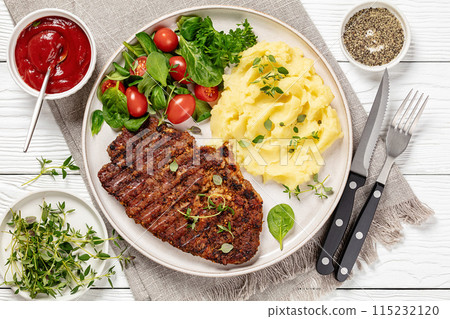 grilled pork steak with mashed potato and salad grilled pork steak with mashed potato and salad 115232120