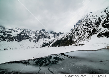 Frozen Lake Morskie Oko or Sea Eye Lake in Poland at Winter. 115232561