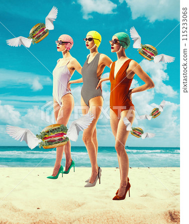 Attractive three women in retro swimsuit standing on beach by the ocean with flying burgers birds. Contemporary art collage. Attractive three women in retro swimsuit standing on beach by the ocean with flying burgers birds. Contemporary art collage. 115233068
