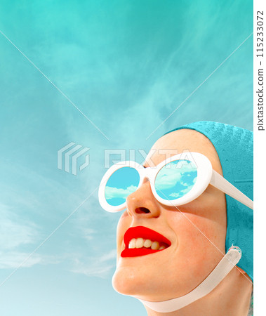 Portrait of beautiful young woman in swimming cap and sunglasses with sky reflection inside. Sunny day. Contemporary art collage. Portrait of beautiful young woman in swimming cap and sunglasses with sky reflection inside. Sunny day. Contemporary art collage. 115233072