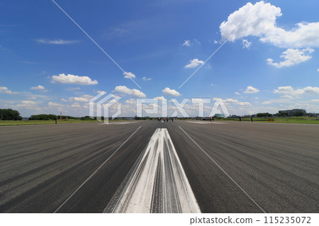 Runway Walk: A long runway and a blue summer sky 115235072