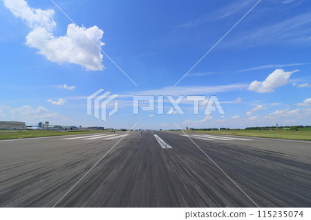 Runway Walk: A long runway and a blue summer sky 115235074