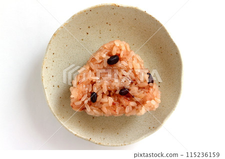 Red rice balls on white background 115236159