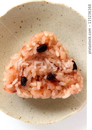 Red rice balls on white background Red rice balls on white background 115236168
