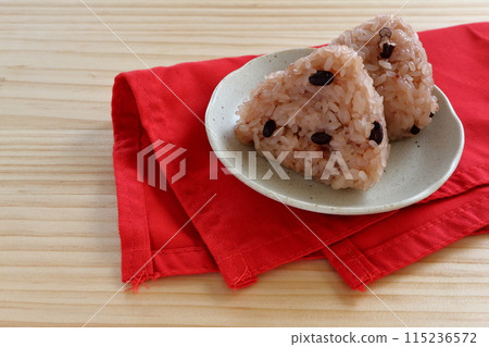 Red rice balls on the table background 115236572