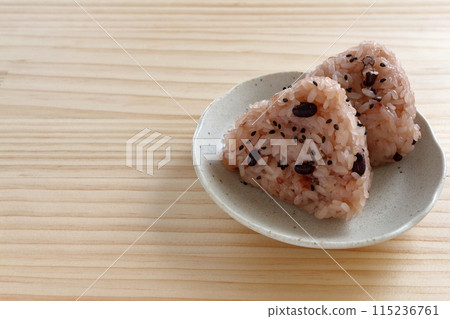 Red rice balls on the table background Red rice balls on the table background 115236761