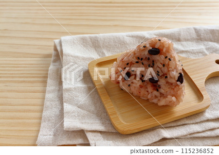 Red rice balls on the table background 115236852