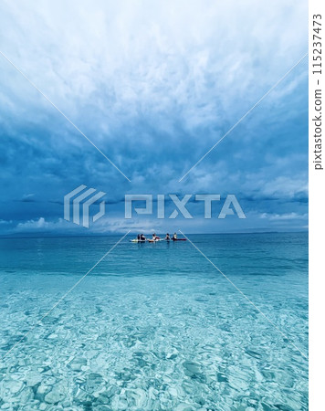 Rocky beach and crystal turquoise water of Ionian Sea in Albania.  115237473