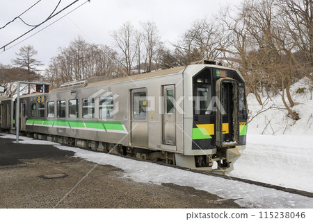 On a gloomy, bitterly cold February day, JR Hakodate Main Line Ozawa Station awaits a few passengers. 115238046