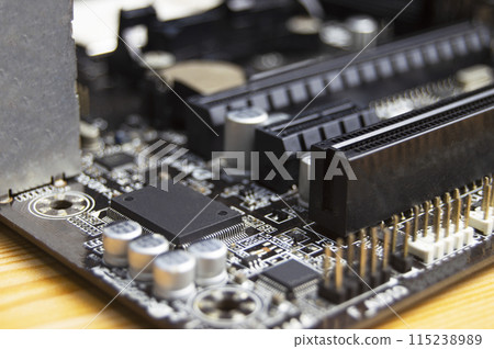 Close-up top view of motherboard, computer motherboard Close-up top view of motherboard, computer motherboard 115238989