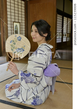 Portrait of a young woman wearing a yukata Portrait of a young woman wearing a yukata 115239806