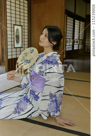 Portrait of a young woman wearing a yukata Portrait of a young woman wearing a yukata 115239808