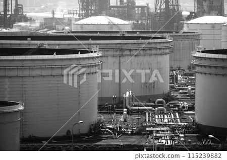 Oil refinery tanks and factories Oil refinery tanks and factories 115239882