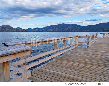 New wooden boardwalk along the waterfront on Okanagan lake New wooden boardwalk along the waterfront on Okanagan lake 115240986