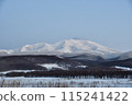Blue winter sky and snow-covered Mount Shari 115241422