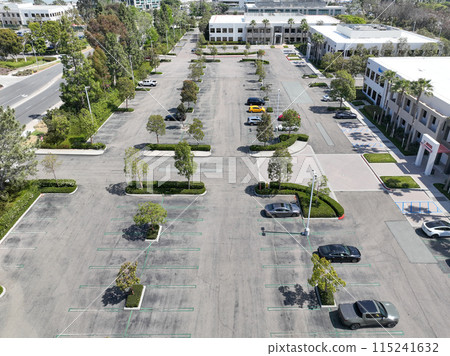 Aerial view of open car parking lot 115241632