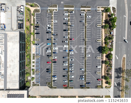 Aerial view of open car parking lot 115241633
