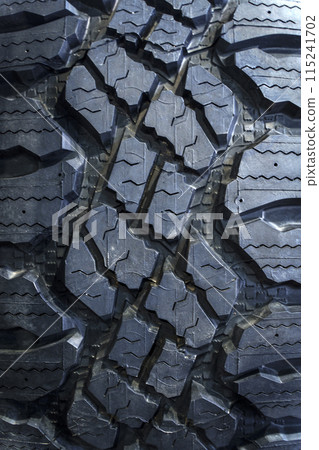 Wheel tire tread. Rubber tire with protection texture Wheel tire tread. Rubber tire with protection texture 115241702
