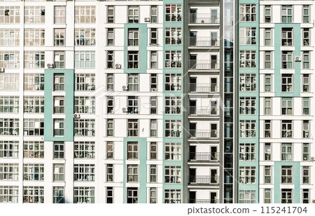 New apartment building of modern architecture. Modern residential quarter of the city. Development, construction, housing concept. New apartment building of modern architecture. Modern residential quarter of the city. Development, construction, housing concept. 115241704