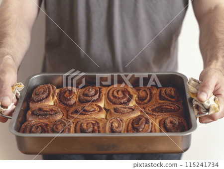 Cinnamon bun roll in plate. Homemade Oven bakery desert for breakfast 115241734