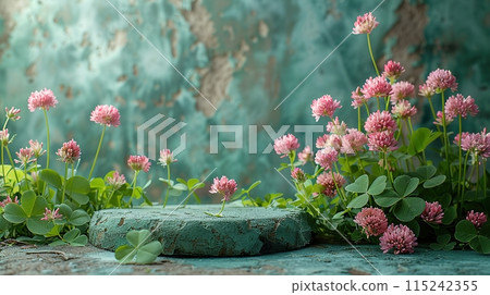 Green podium surrounded by pink clover flowers and clover leaves in a soft, natural setting. Generated AI. 115242355