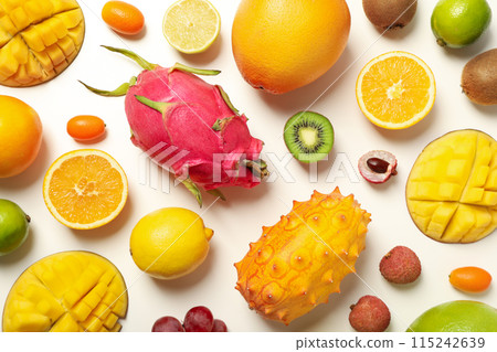 Set of tropical fruits on white background, top view Set of tropical fruits on white background, top view 115242639