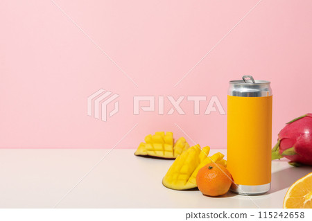 Tropical fruit, tin cans on light pink background, space for text 115242658