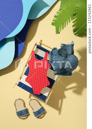 Swimsuit and other accessories for a summer trip to the sea. 115242661
