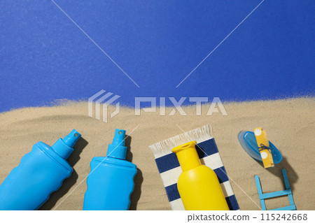 Means for safe tanning, on the background of the sea, flatlay. Means for safe tanning, on the background of the sea, flatlay. 115242668
