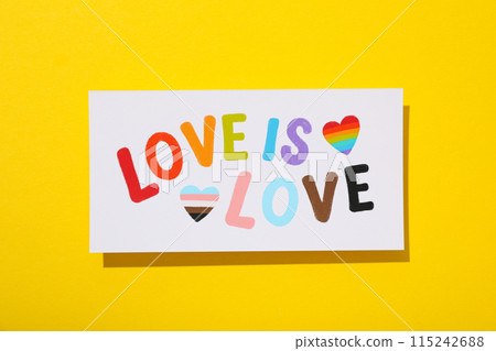 LGBT parade concept, free love symbol on yellow background. 115242688