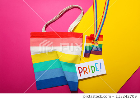 Concept of lgbt parade, rainbow shopper, on color background. Concept of lgbt parade, rainbow shopper, on color background. 115242709
