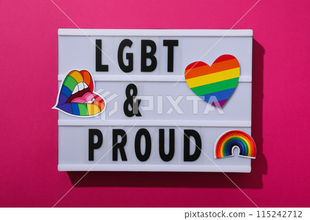 LGBT parade concept, holiday symbols on pink background. 115242712