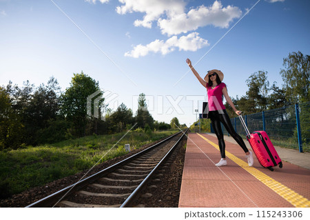 A young teenager from high society, she leaves the provinces on her first vacation trip and waits on the train platform for her train. 115243306