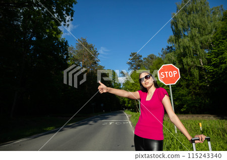 An adult teenager goes on a hitchhiking holiday trip and begins her journey from her native village situated among a lush forest. 115243340