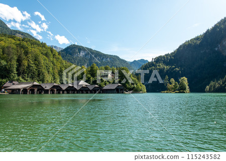 Boathouses at Lake Koenigssee in Schoenau in Bavaria Boathouses at Lake Koenigssee in Schoenau in Bavaria 115243582