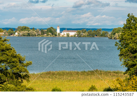 View from Herreninsel to the Monastery on Fraueninsel Island 115243587