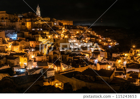 Scenic skyline of Sassi di Matera at night, Southern Italy 115243653