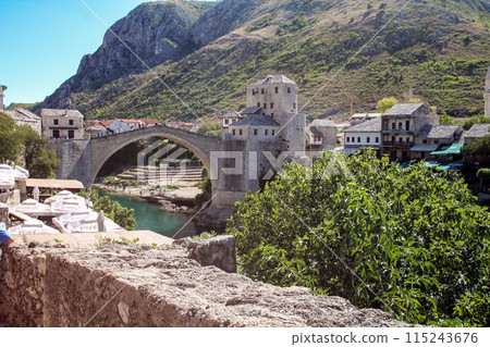 Rebuilt iconic ancient bridge in downtown Mostar 115243676