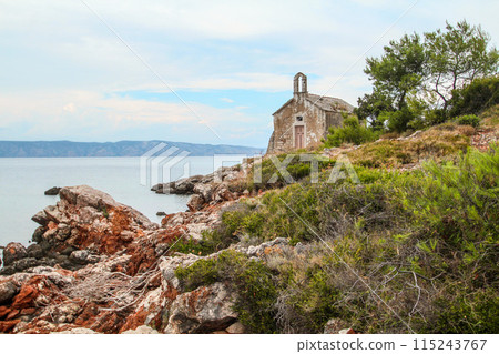 Beautiful little abandoned chapel at the coast of Hvar island 115243767
