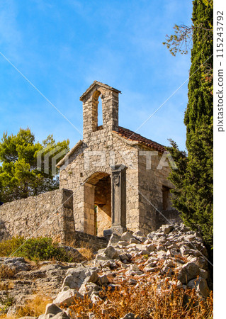Scenic little chapel in the remoteness of the hills of Hvar island 115243792