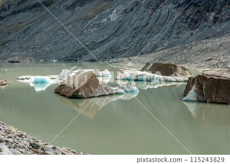 Colorful ice at the Pasterze Glacier at the Mount Grossglockner 115243829