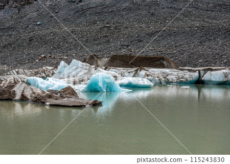 Colorful ice at the Pasterze Glacier at the Mount Grossglockner Colorful ice at the Pasterze Glacier at the Mount Grossglockner 115243830