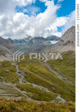 Scenic alpine landscape in the High Tauern National Park during a hike around Mt. Grossglockner Scenic alpine landscape in the High Tauern National Park during a hike around Mt. Grossglockner 115243845