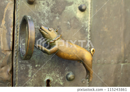 Medieval door handle at the church on Quedlinburg castle 115243861