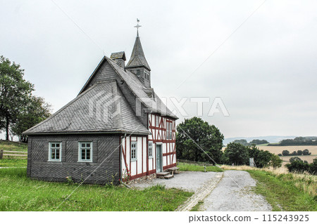 Scenic rustic school house in the rural landscape of Germany 115243925