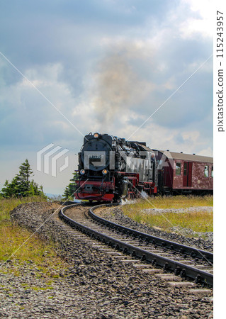 Antique steam locomotive in the Harz mountains 115243957